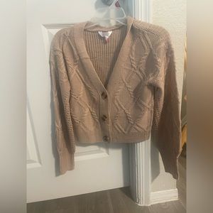 Cream colored cropped button up knit cardigan